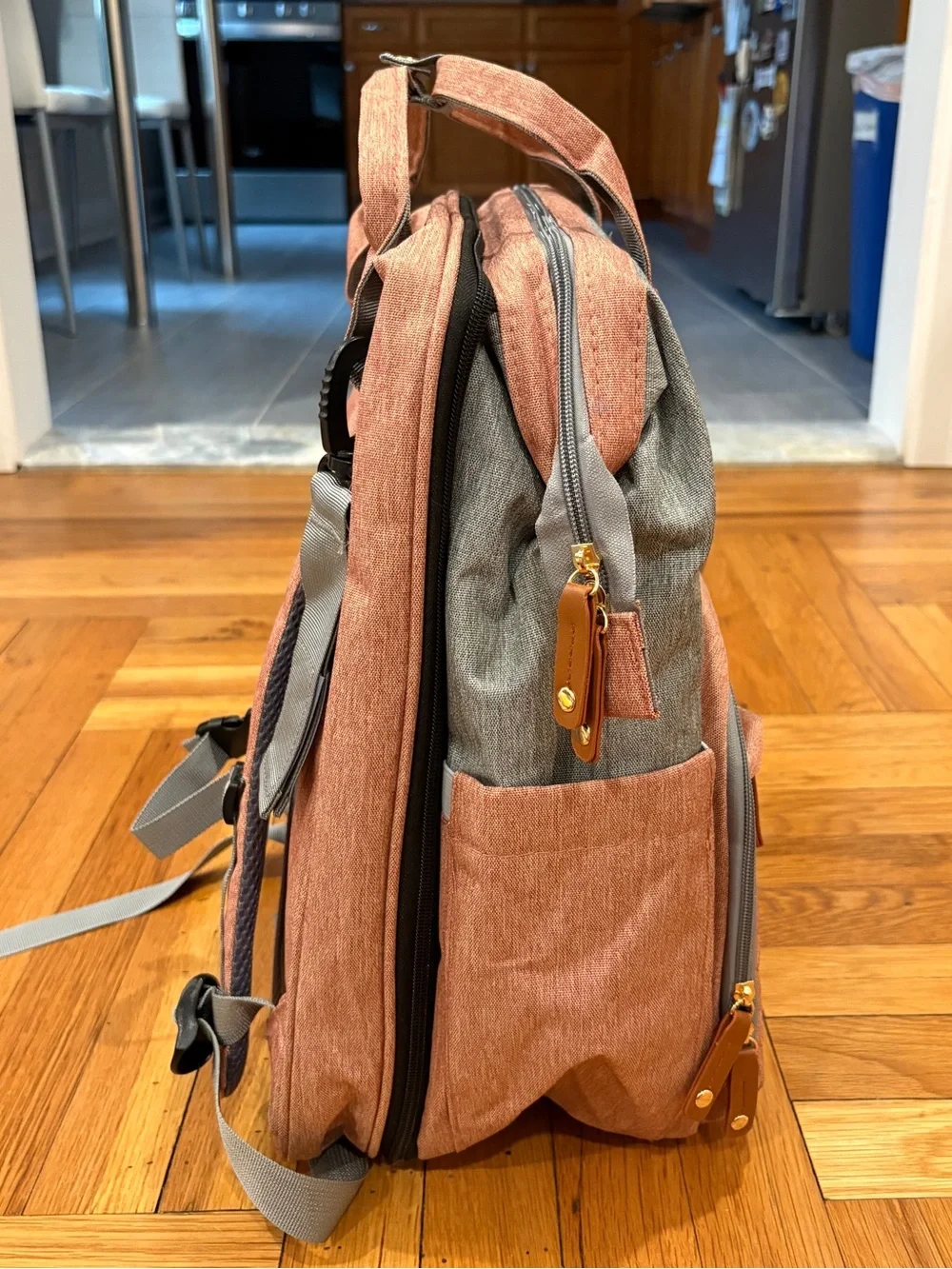 Brand new diaper bag, folds out with a bed